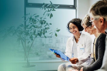 Doctor talking with elderly couple