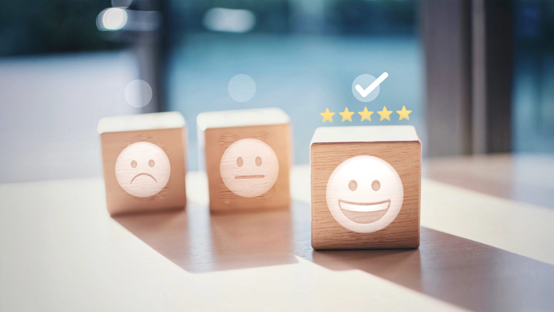 wooden blocks with face emojis