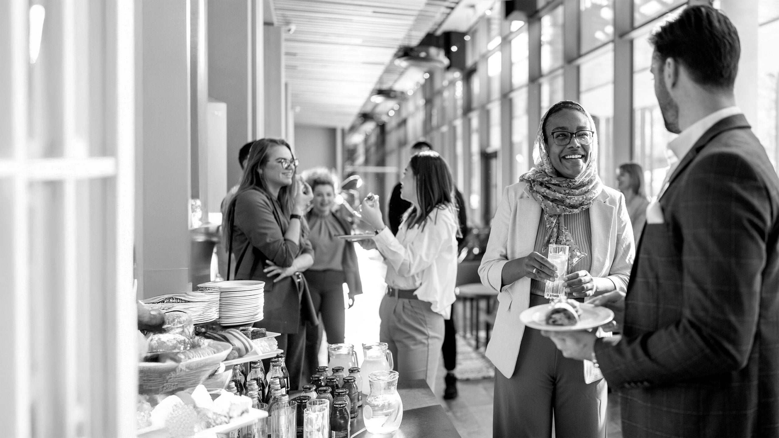 People gather in reception with food