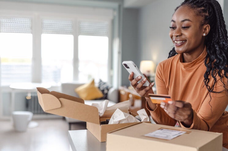 Woman unpacking box