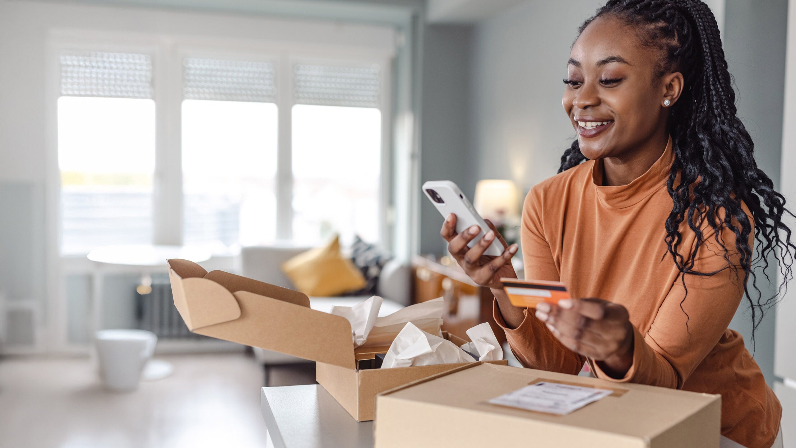 Woman unpacking box