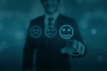 Man reaching out to touch smiley-face sentiment icon
