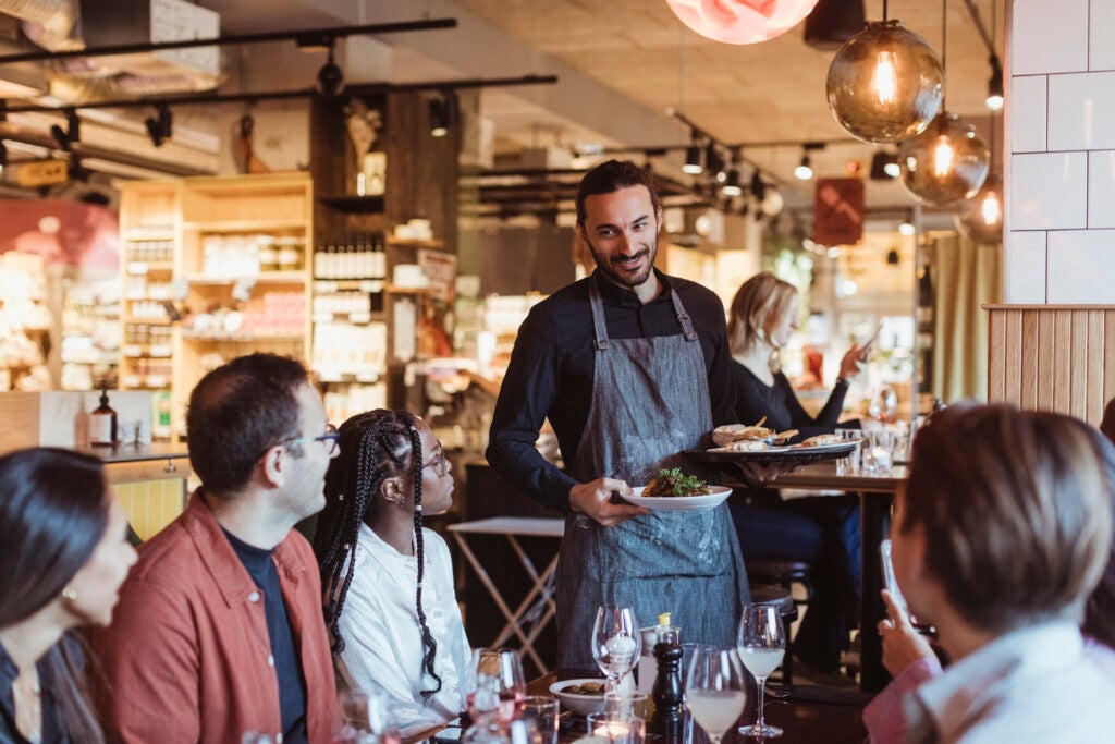 Restaurant server and patrons