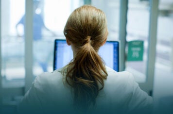 Woman looking at a computer screen